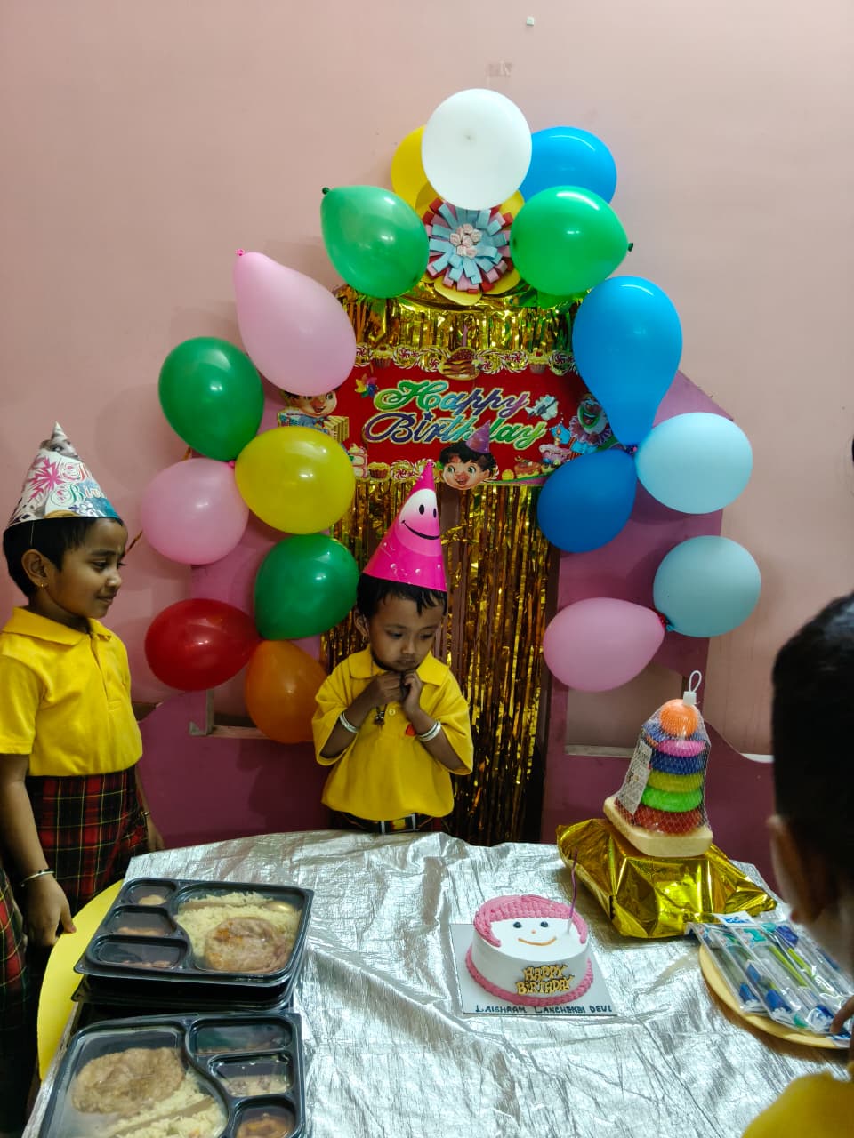 Children with learning materials at Buds & Blossoms