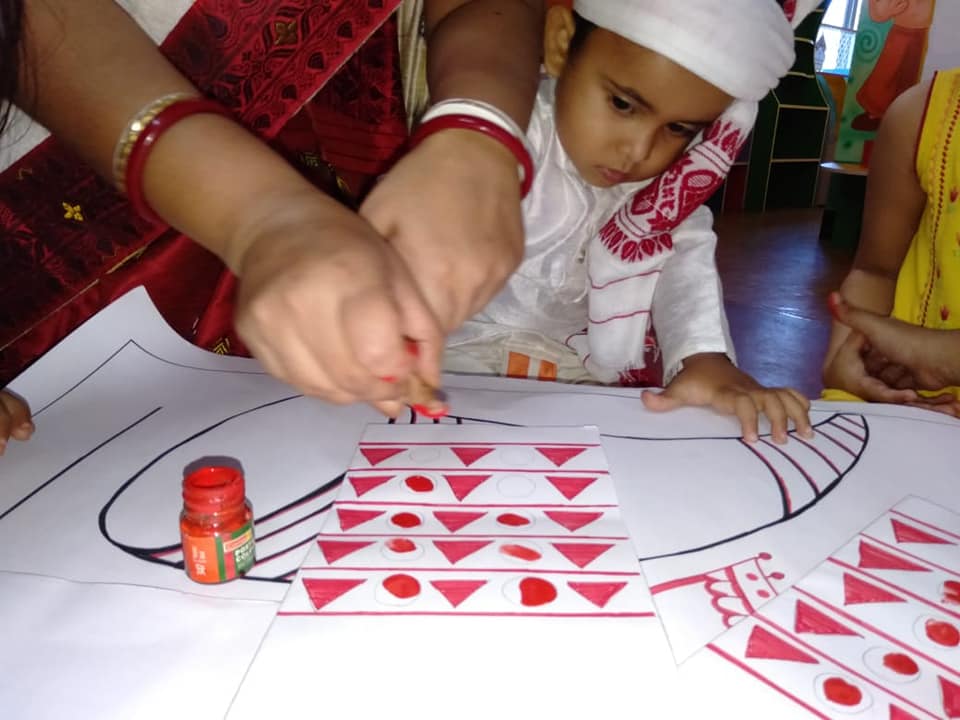 Happy children learning in a bright, nurturing classroom